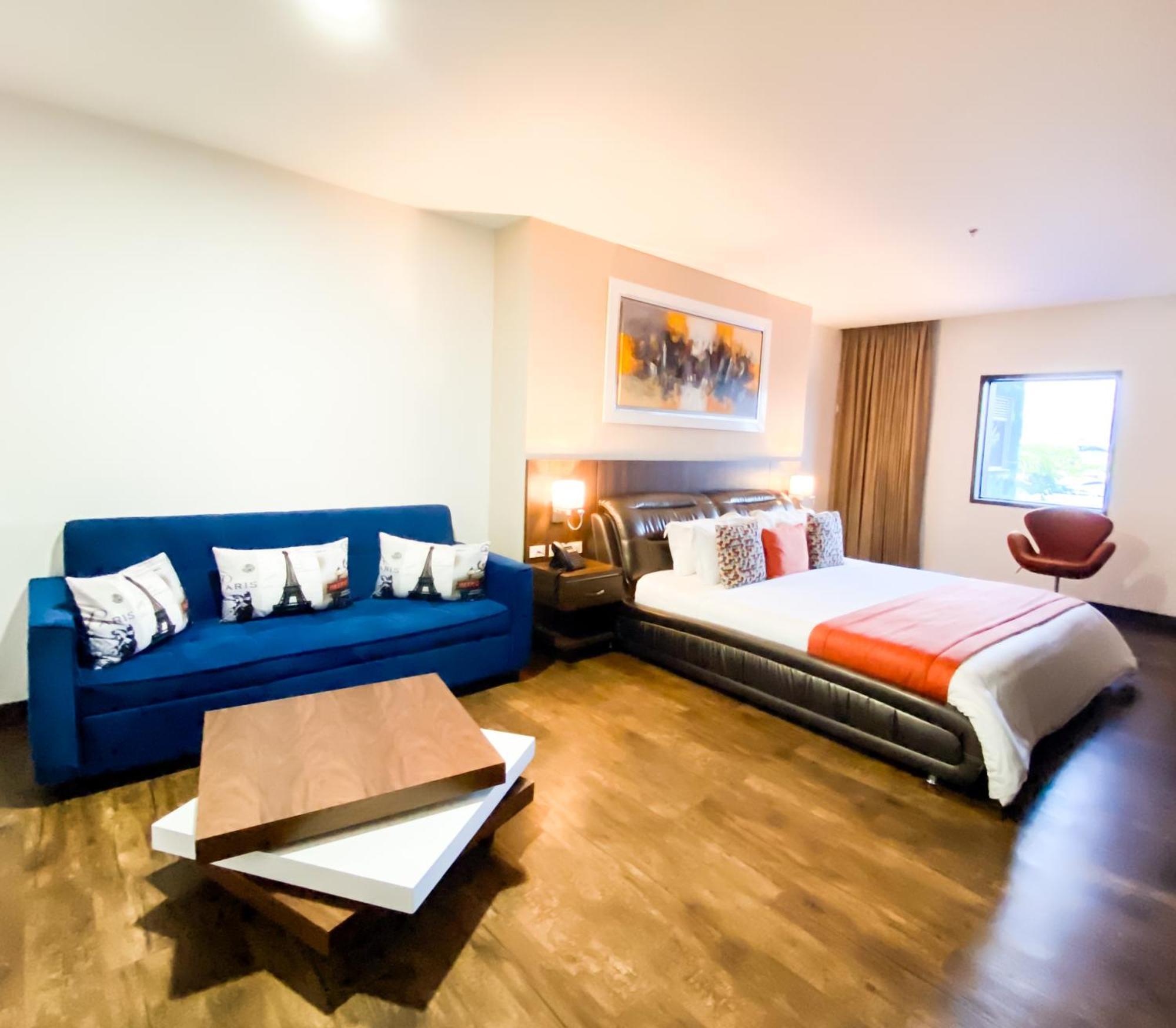 Hotel Royal Elim International Калі Екстер'єр фото A room at the hotel